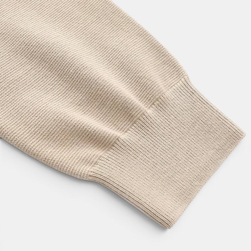 Allzom beige knitted sweater with contrast stitching detail on the cuff and sleeve.