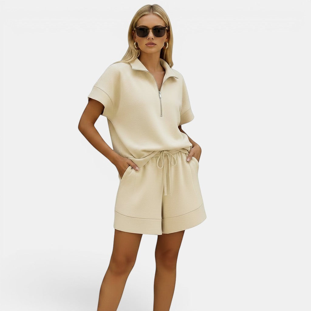 Allzom women's beige short sweatshirt and shorts two-piece set with zip collar and drawstring waist.