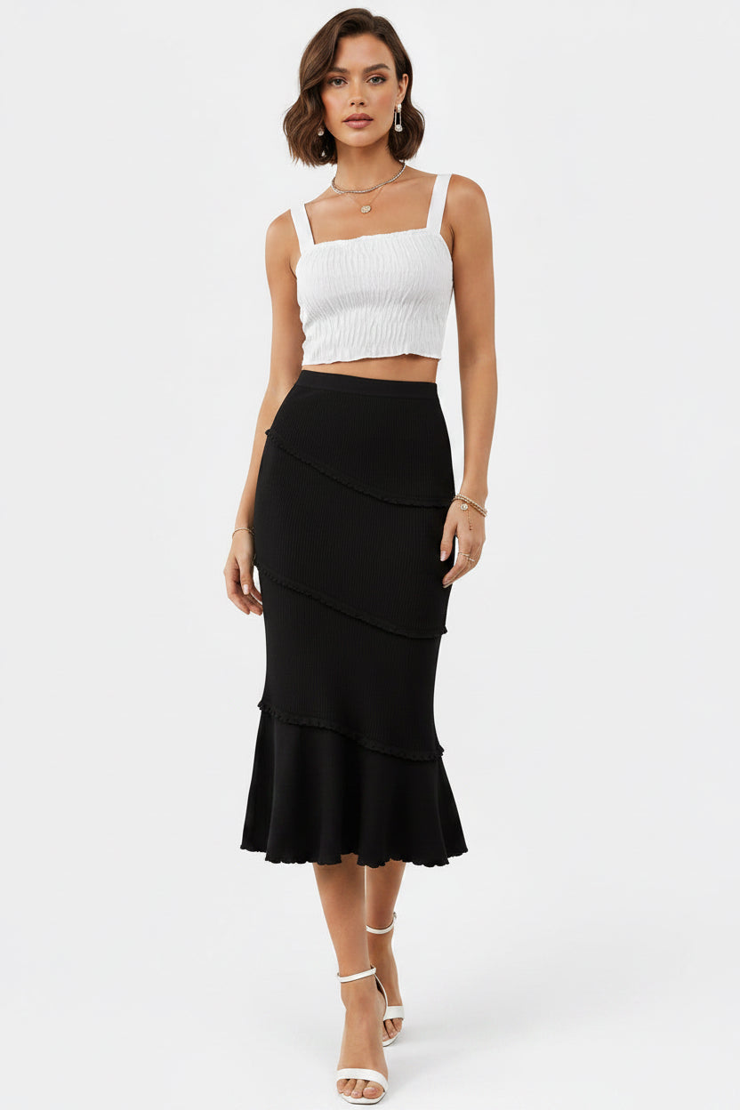 Allzom black knitted fishtail midi skirt with ruffled trim and patchwork detail, elegant business wear.