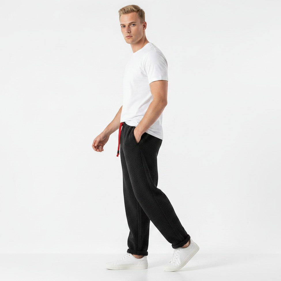 Allzom men's black lambswool thermal trousers with retro grain texture and red drawstring. Casual fit.