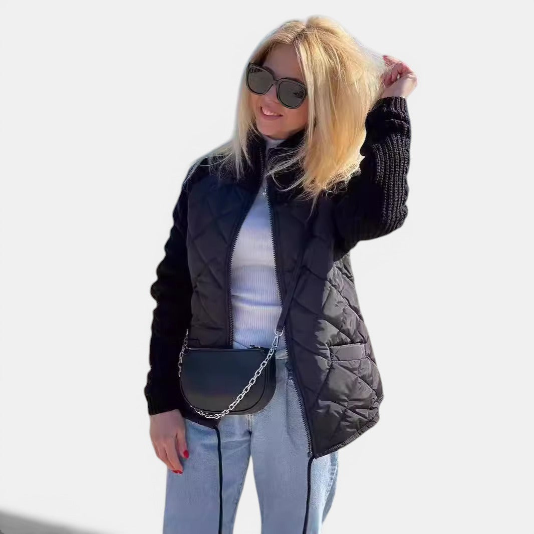Allzom women's black quilted jacket with knitted sleeves and stand collar, featuring a zipper closure and pockets.
