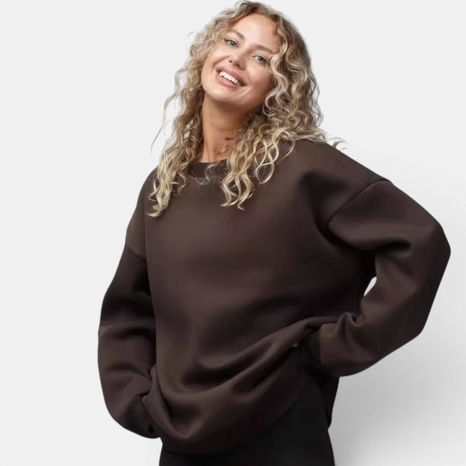 Allzom women's loose-fit crew neck sweatshirt in solid brown, made from soft pullover fabric.