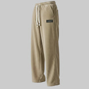 Calças de bombazina bege de corte reto da Allzom com cordão branco e etiqueta preta, ideais para um look casual-chic.