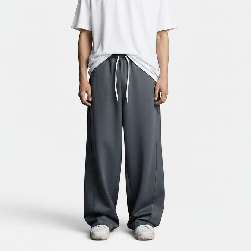 Calças largas Allzom cinzentas de perna direita com cordão branco, estilo high-street.