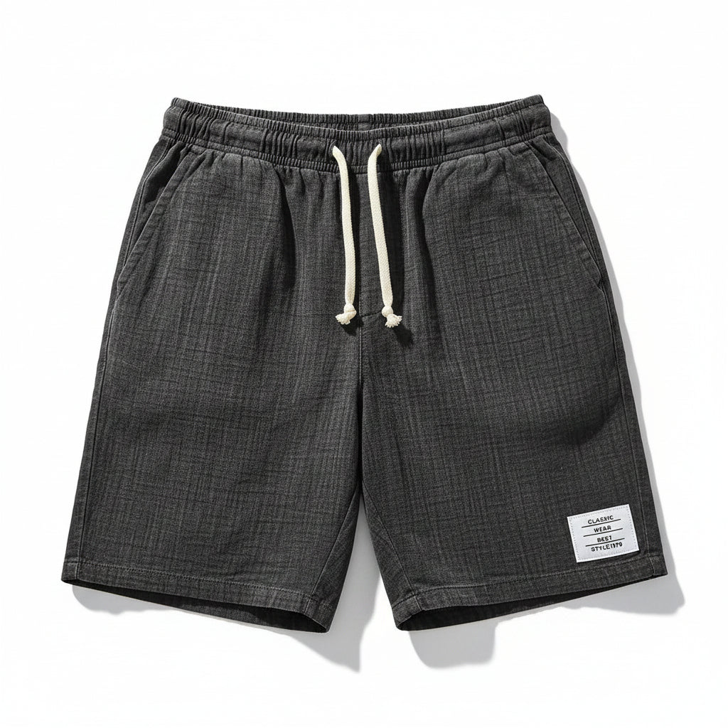 Calções Allzom de poliéster cinzentos com cordão e textura, ideais para praia.