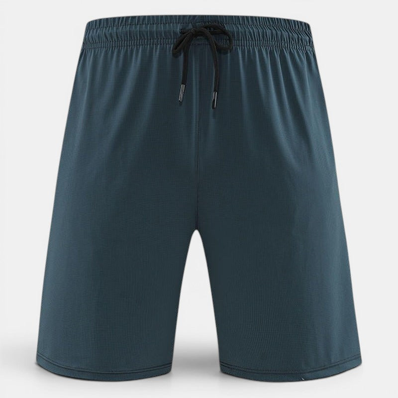 Calções desportivos Allzom de nylon azul-petróleo para homem, com cordão e cintura elástica, ideais para corrida.