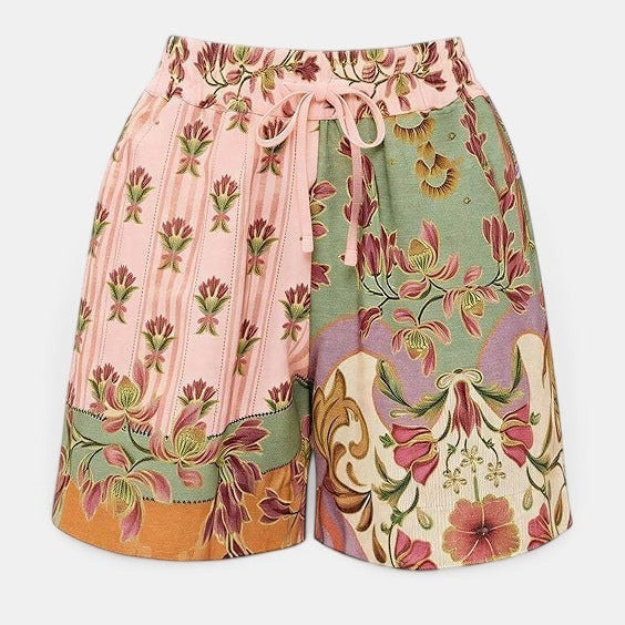 Calções Allzom de linho com estampado floral e riscas em tons de rosa e verde, cintura elástica com cordão.