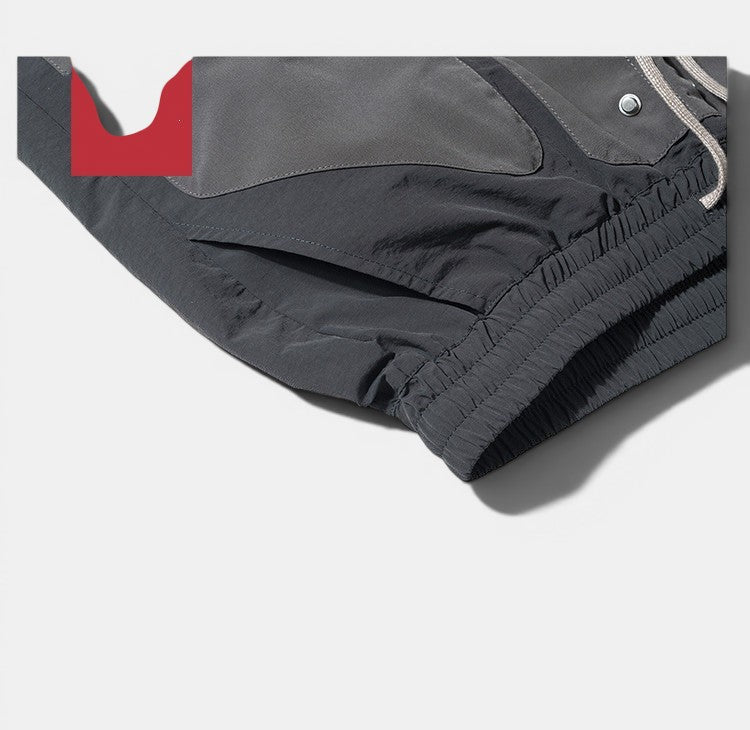 Calções pretos de algodão Allzom com cintura elástica e bolsos funcionais, estilo streetwear.