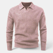 Camisola de malha Allzom rosa com gola polo e textura. Manga comprida, punhos e bainha canelados.