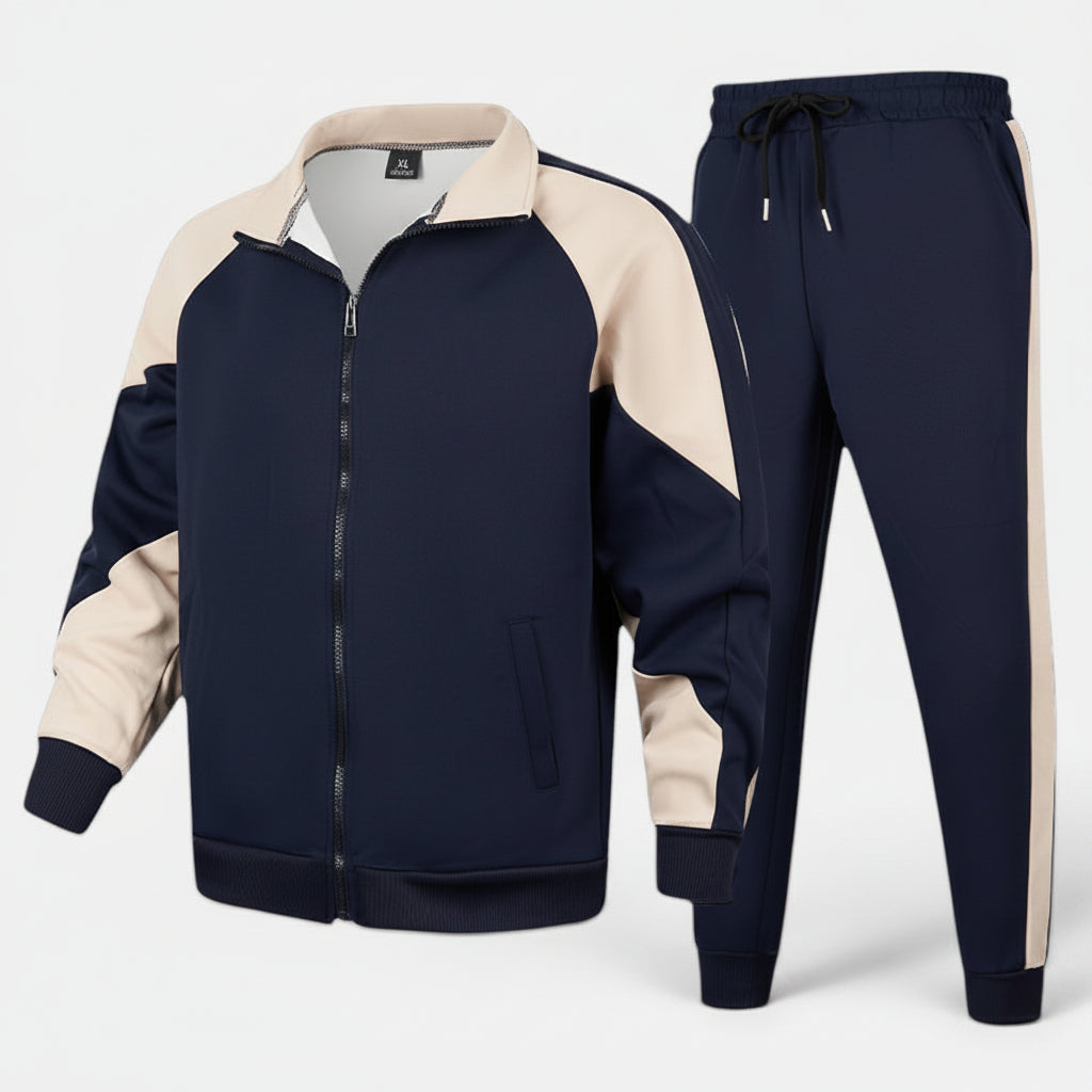 Conjunto de fato de treino Allzom em azul-marinho e bege, com fecho de correr e calças de cintura subida.