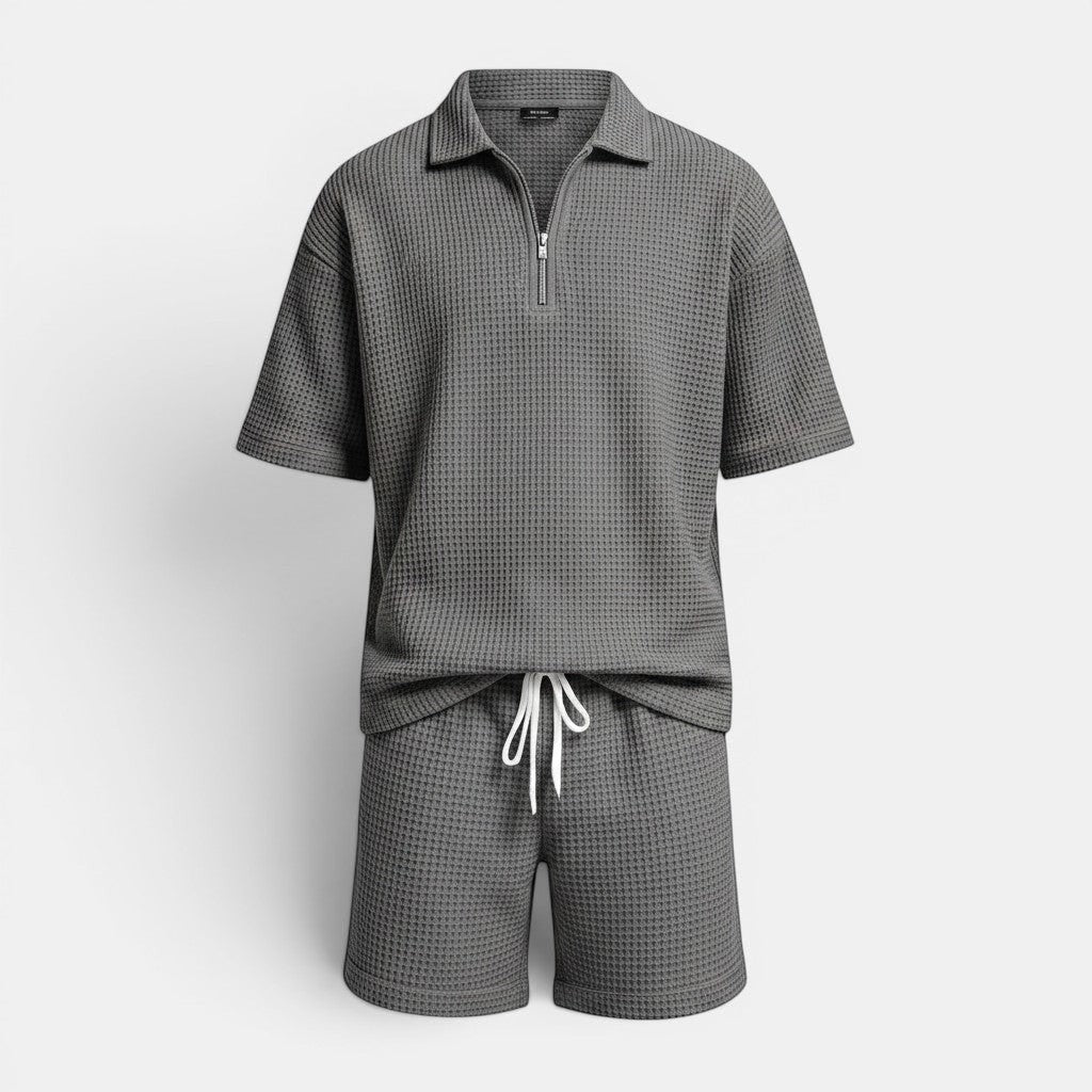 Conjunto Allzom de malha texturizada cinzenta com fecho de correr e calções curtos para homem.