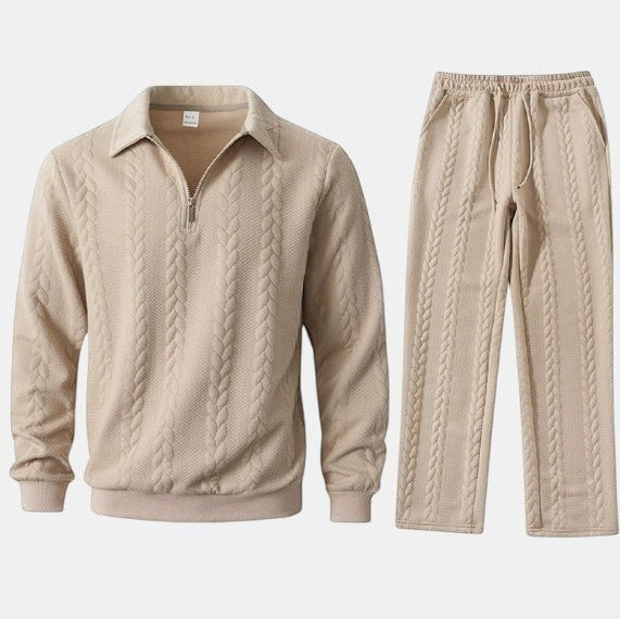 Conjunto Allzom de camisola com fecho de correr e calças em jacquard bege com padrão de trança.