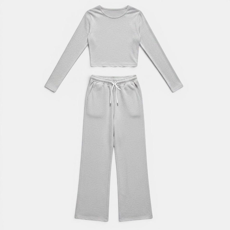 Conjunto de yoga Allzom de duas peças em cinza, com top cropped de manga comprida e calças de perna larga.