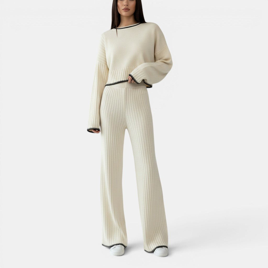 Allzom women's cream knitted two-piece set with black trim, featuring a cropped sweater and wide-leg pants.