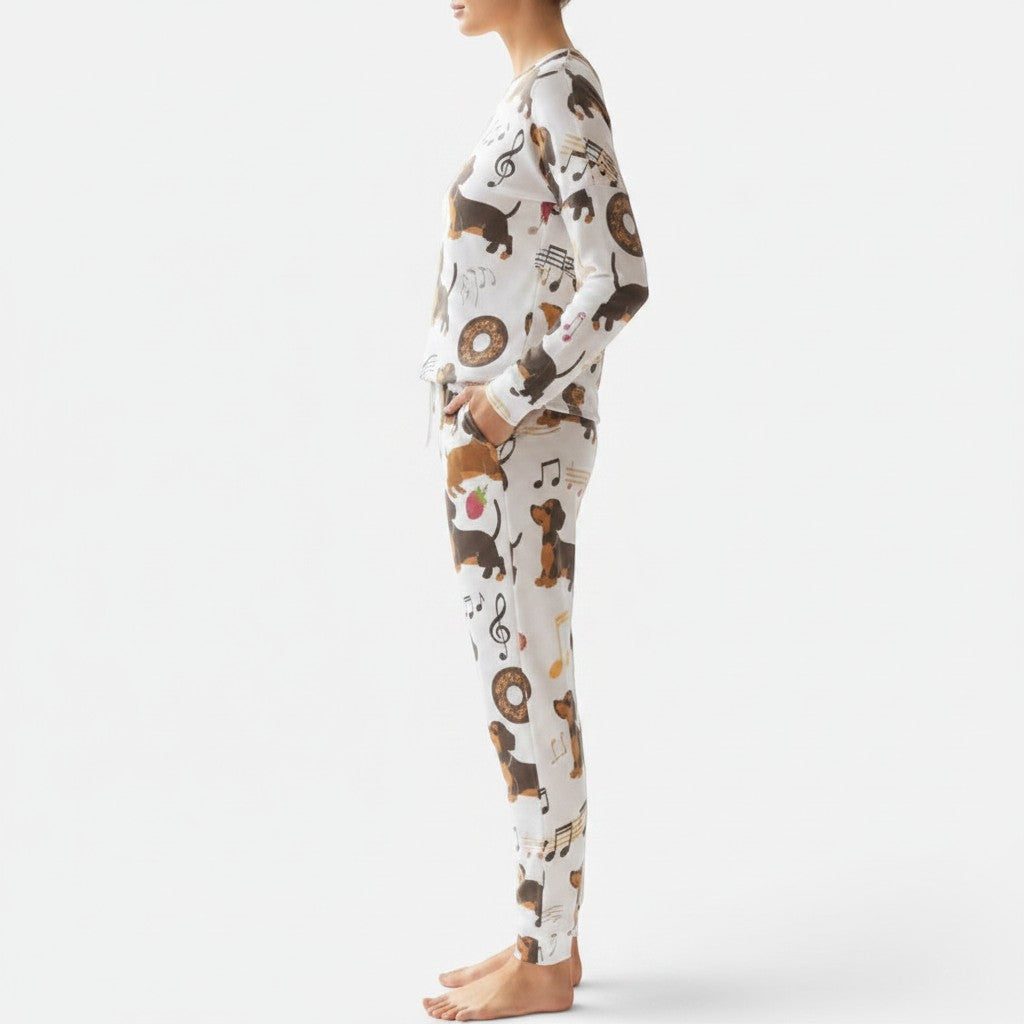 Allzom women's white pajama suit with dachshunds, donuts, and musical notes print. Long sleeves and pants.