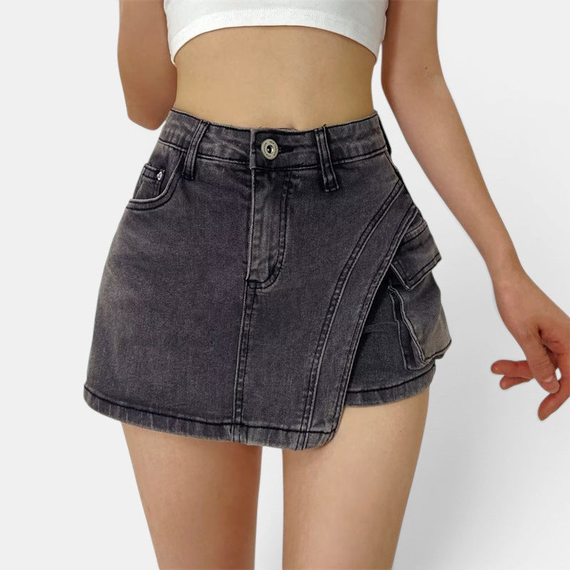 Allzom Asymmetric hem denim culotte shorts in vintage blue with pocket details and a hip-wrapped design.