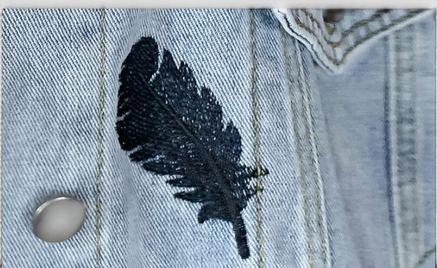 Allzom light blue denim jacket with black feather embroidery and lapel collar. Casual street style.