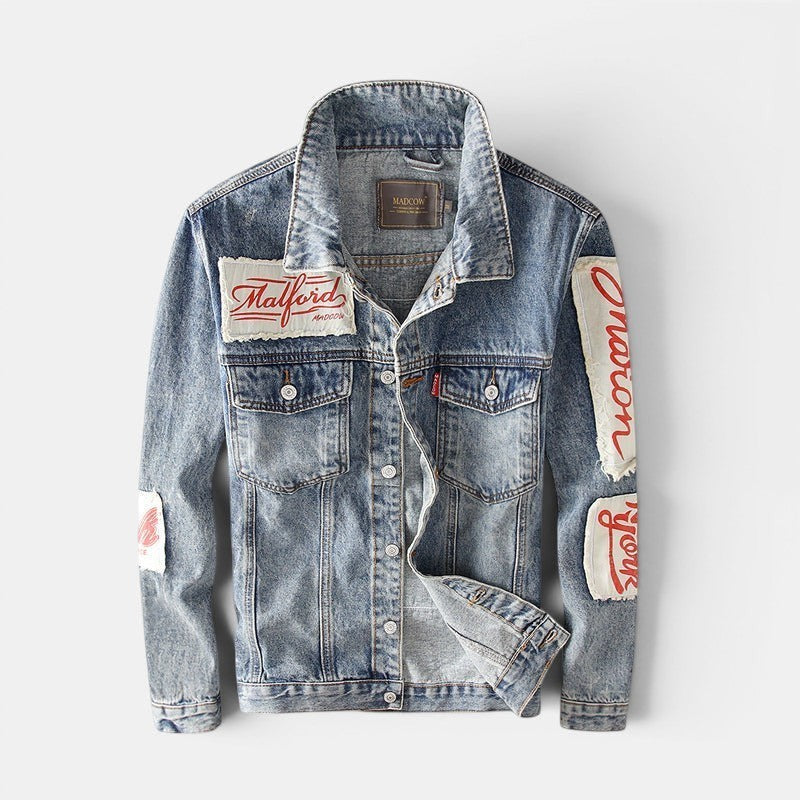 Allzom men's light wash denim jacket with red embroidered patches and text detail on sleeves. Classic collar, button closure.