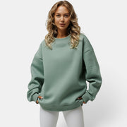 Allzom women's sage green crew neck loose-fit pullover sweatshirt made from soft, breathable fabric.
