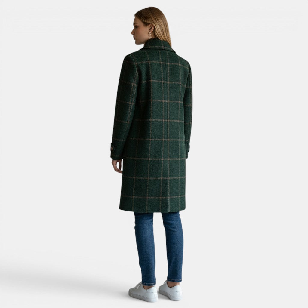 Allzom green plaid mid-length jacket with lapel collar and button detail. Model wears jeans and white sneakers.