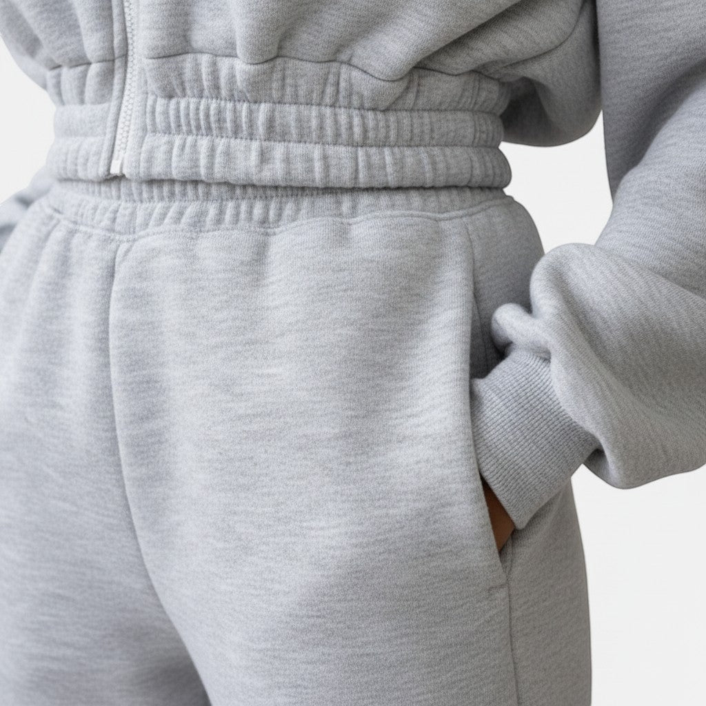 Allzom grey knit hooded top and ankle-banded pants sports suit with elasticated waistband and cuffs.