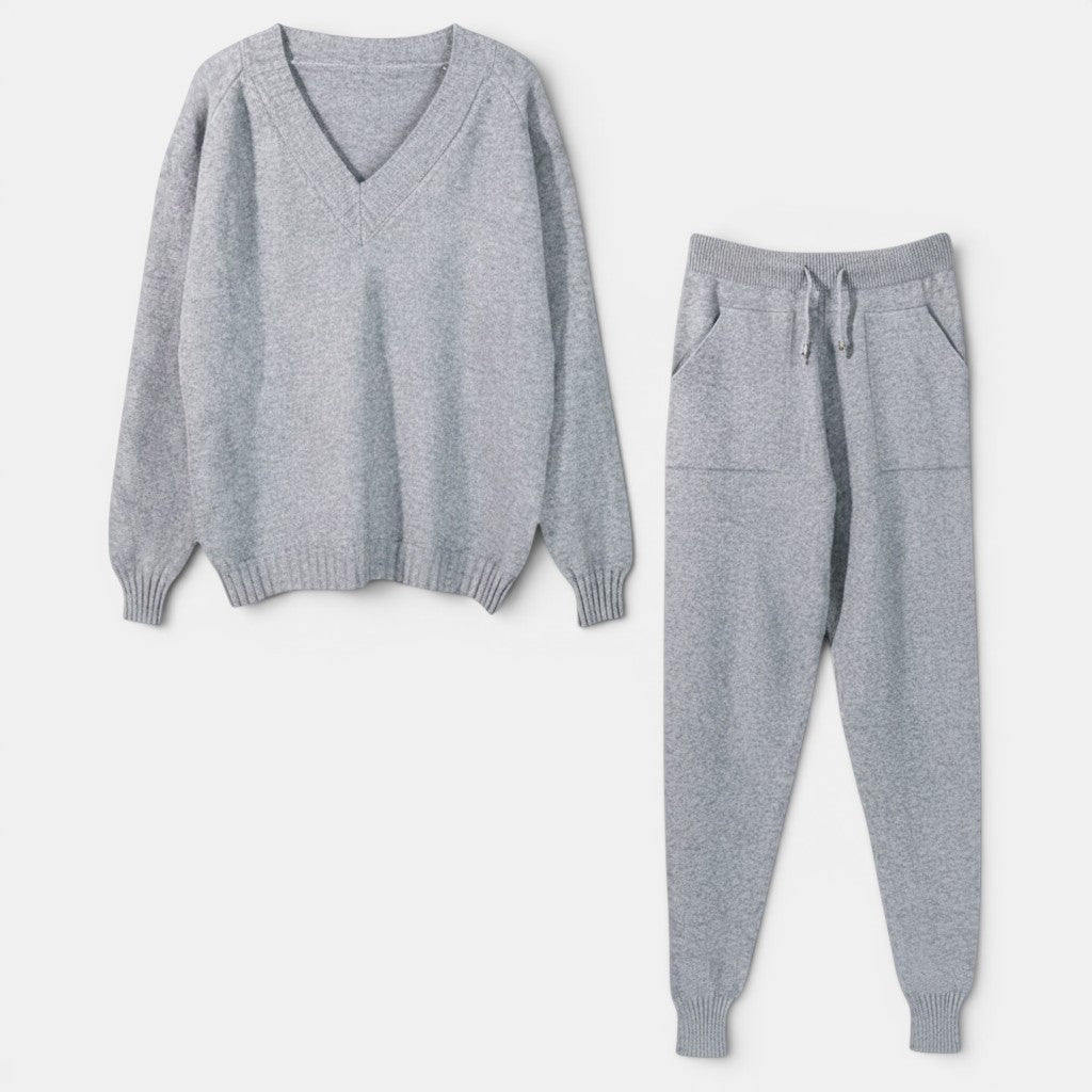 Allzom women's grey V-neck long-sleeve knitted suit with matching trousers and pockets.