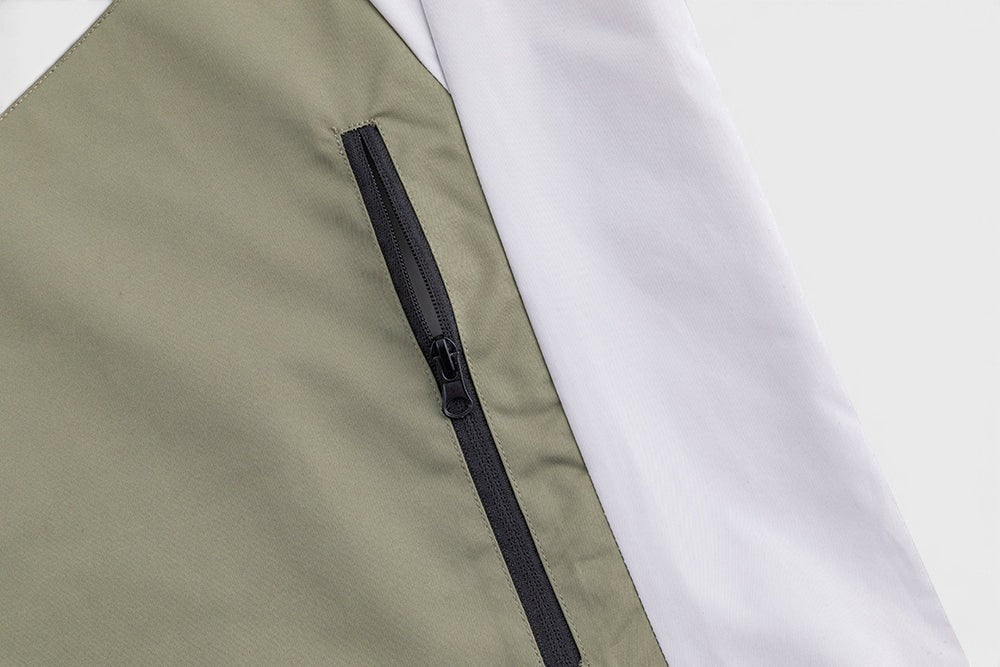 Allzom men's hiking jacket in olive green and light grey with black zip pocket. Technical, wind & rain resistant.