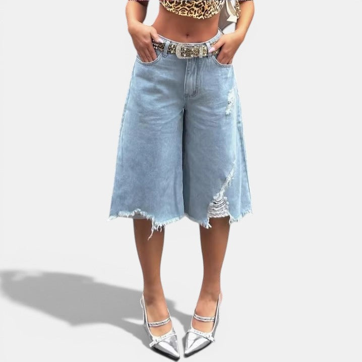 Allzom light blue denim culottes with raw hem and distressed details, mid-waist, relaxed fit.