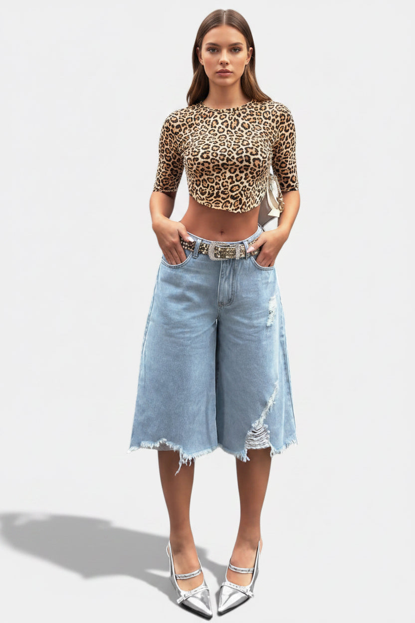Allzom light blue denim culottes with raw hem and distressed details, mid-waist, relaxed fit.