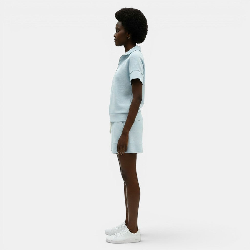 Allzom women's light blue short sweatshirt and shorts two-piece set, casual short-sleeved polo collar.