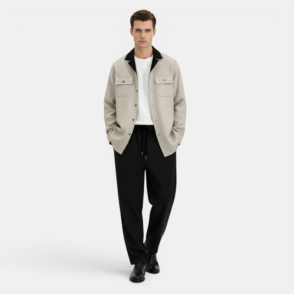 Allzom Men's beige casual suit coat with black collar and pockets, worn over a white t-shirt and black trousers.