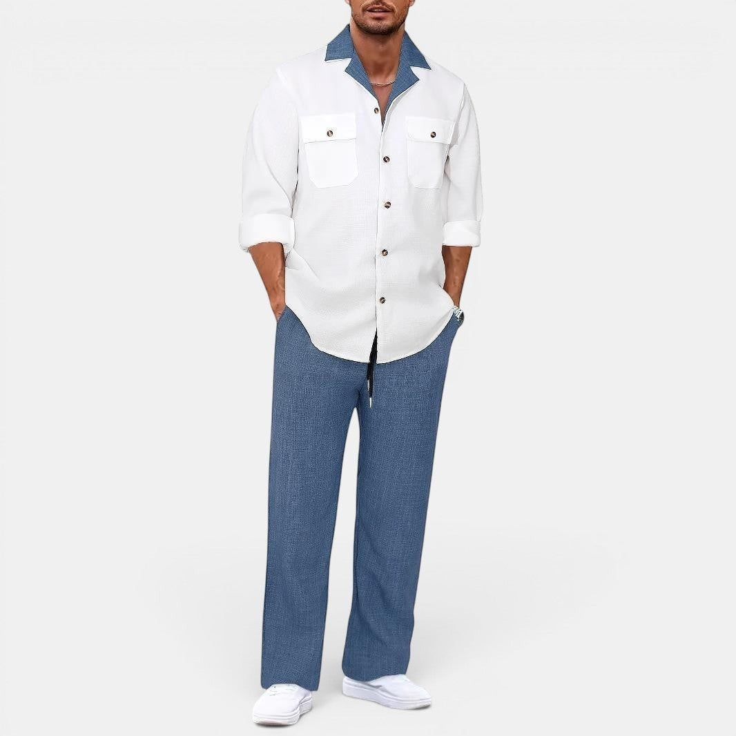 Allzom Men's white long-sleeve shirt with blue collar and two chest pockets, paired with blue textured trousers.