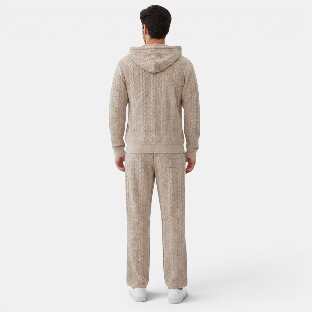 Allzom Men's beige jacquard knit hoodie and trousers set with cable knit pattern. Model from behind.