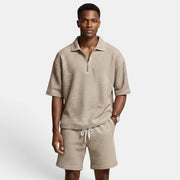 Allzom men's beige waffle knit zip-up short-sleeve polo and matching shorts set.