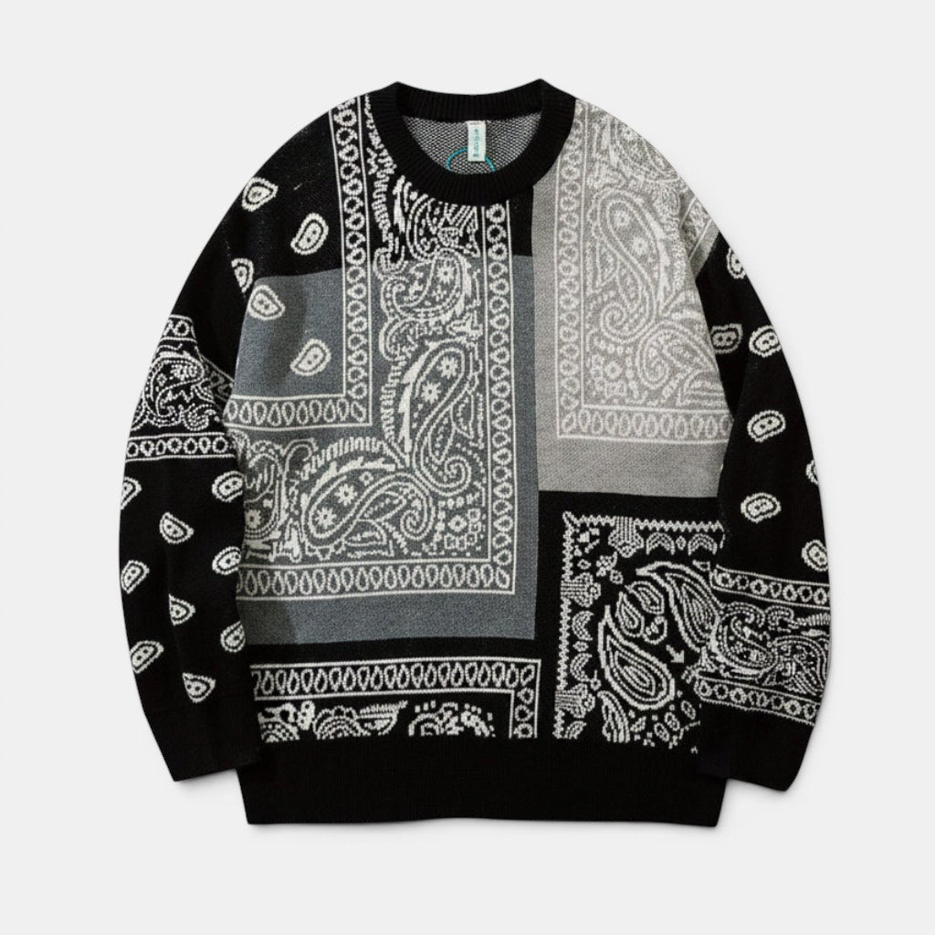 Allzom crew neck knitted sweater with black, grey and white paisley patchwork design. Long sleeves and ribbed cuffs.
