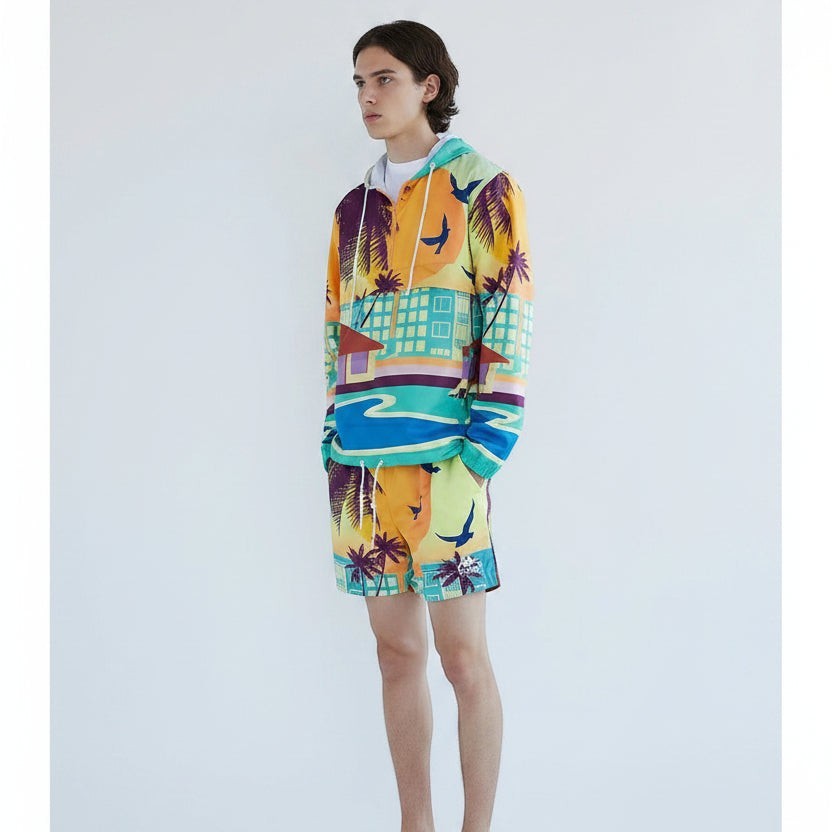 Allzom men's two-piece set with a colourful graphic print hooded sweater and matching shorts, featuring palm trees and buildings.