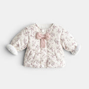 Allzom cream quilted coat with purple floral print and pink bow detail. Fleece lined for warmth.