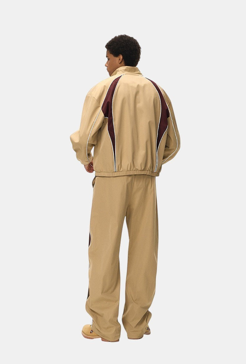 Allzom Men's Retro Racing Jacket and Wide-Leg Pants in beige with burgundy accents and white piping. Model from behind.