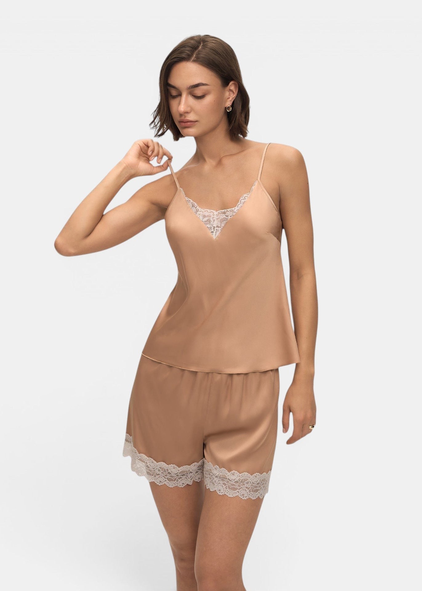 Allzom nude satin cami top and shorts set with white lace trim. Model wears a size S.