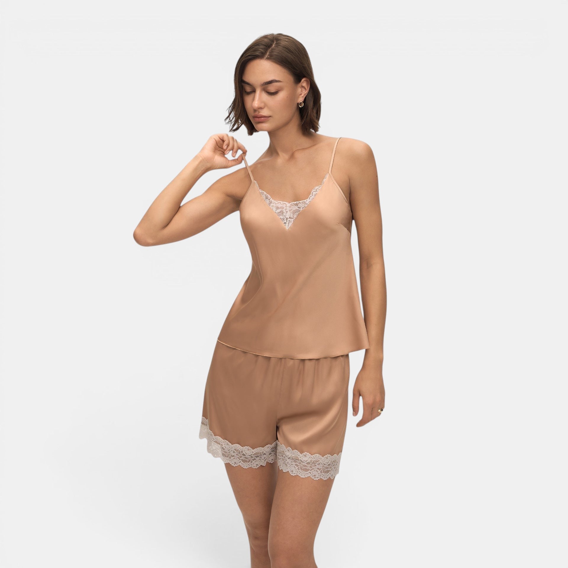 Allzom nude satin cami top and shorts set with white lace trim. Model wears a size S.