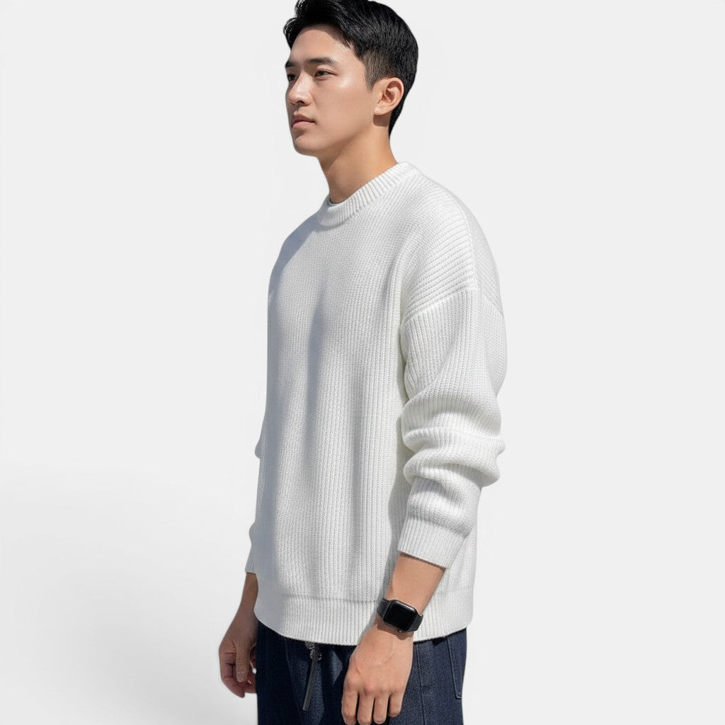 Allzom Men's white chunky-knit crew-neck sweater with ribbed texture and relaxed fit, worn by a model with dark jeans and a smartwatch.