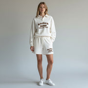 Allzom white corduroy long-sleeve sweater with a polo collar and embroidered logo. Relaxed fit, ideal for casual wear.